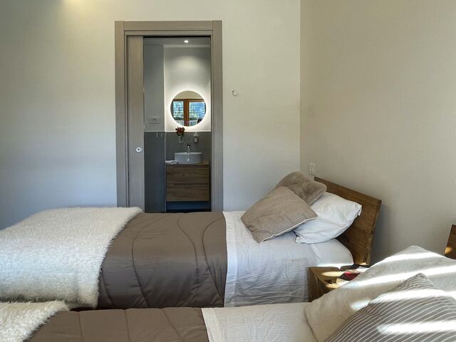 Camera da letto con accesso diretto al bagno privato